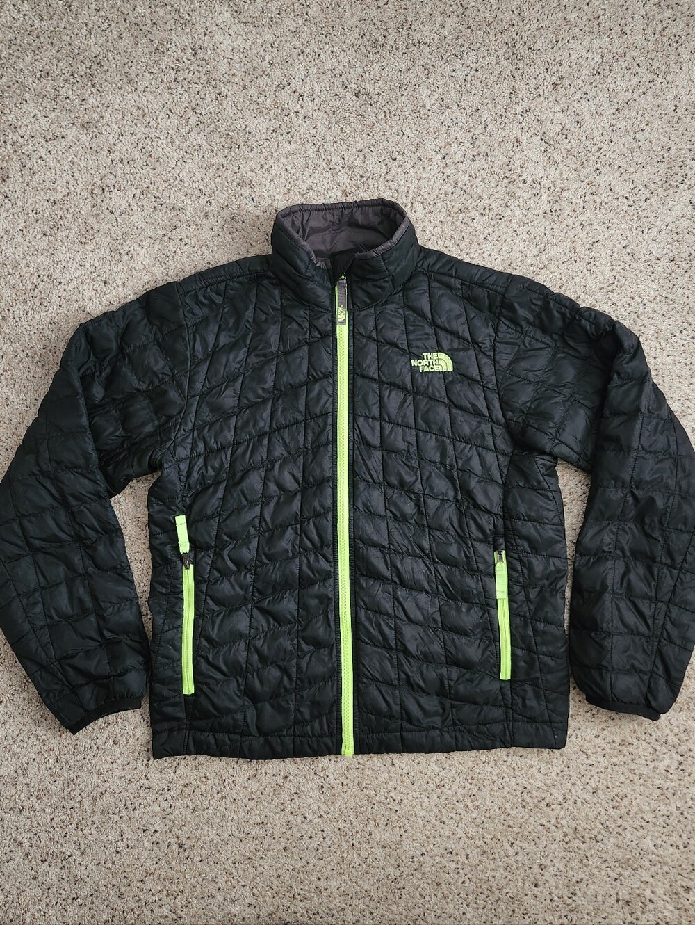 The North Face Kids Black Puffer Jacket with Neon Green Accents